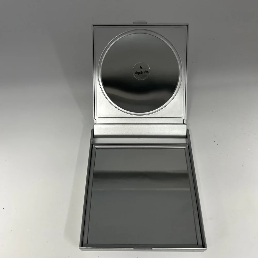 Sensé Beautiful Science compact sleek silver casing built-in mirror